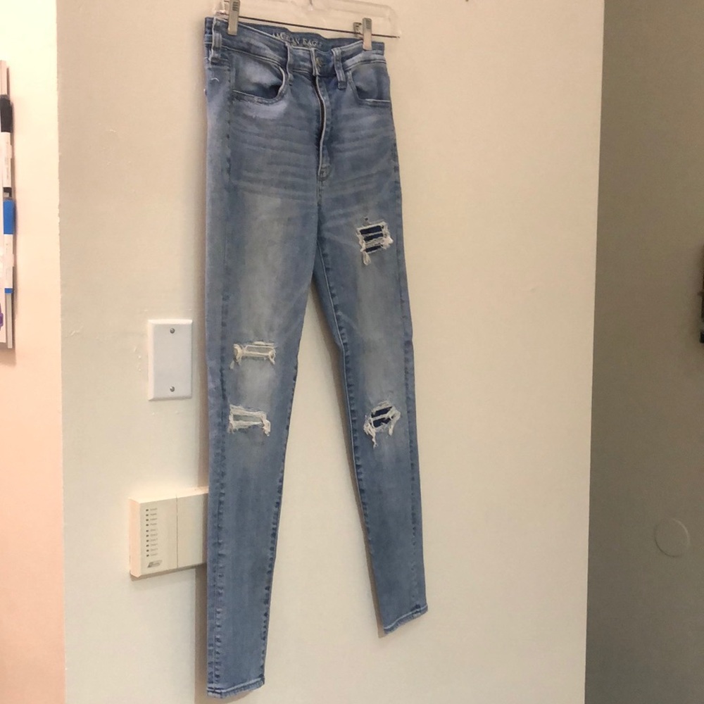 super stretch american eagle ripped skinny jeans